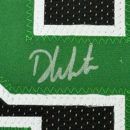 Framed autographed green mesh basketball jersey with white stitched trim and black perforated panel by derrick white