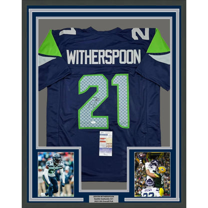 Framed Devon Witherspoon Seahawks jersey with autographs, action photos, and JSA COA for your man cave