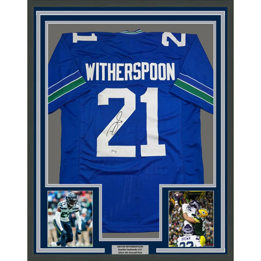 Framed Autographed Devon Witherspoon 35x39 Seattle Blue Retro Football Jersey Beckett BAS COA | Hall of Fame Sports Memorabilia | vintageantiquesgifts.com