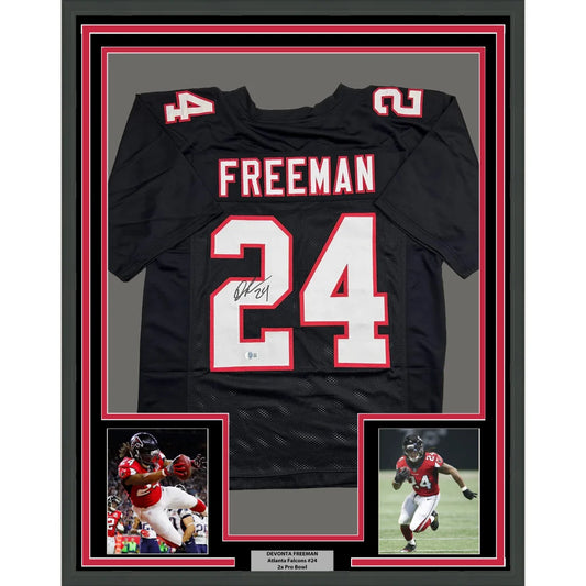 Framed Autographed Devonta Freeman 35x39 Atlanta Retro Black Football Jersey Beckett BAS COA | Hall of Fame Sports Memorabilia | vintageantiquesgifts.com