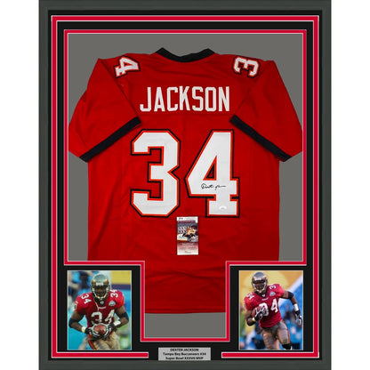 Back of red tampa bay buccaneers football jersey with white and black trim signed by dexter jackson featuring name jackson and number 34