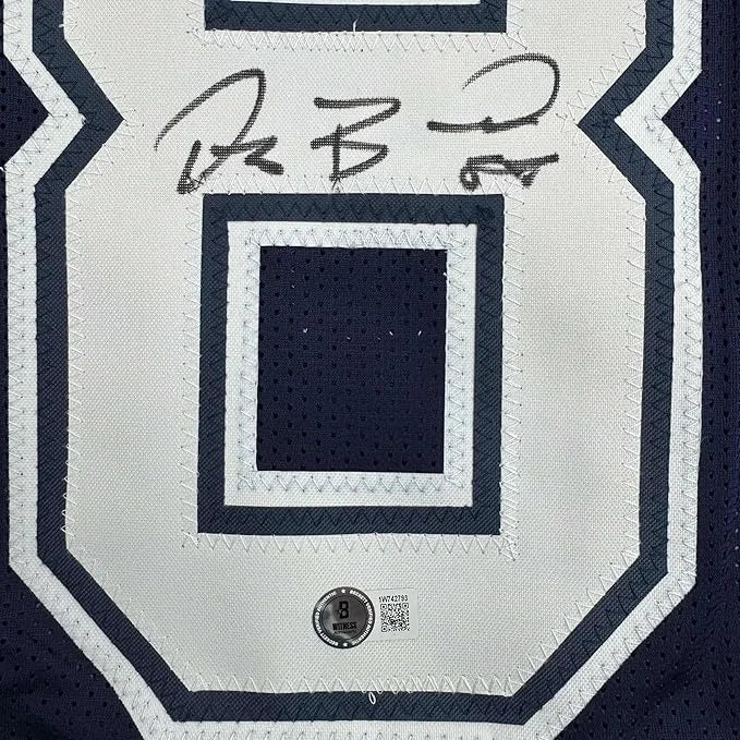 Framed autographed Dez Bryant navy Dallas Cowboys jersey back with number 9 Beckett COA