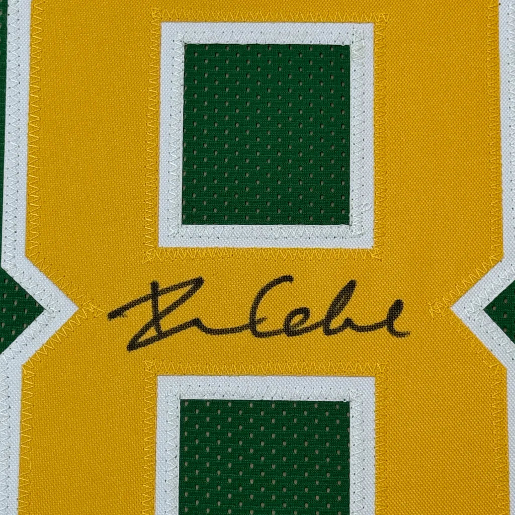 Autographed Green Bay Packers jersey in green and gold ready to display