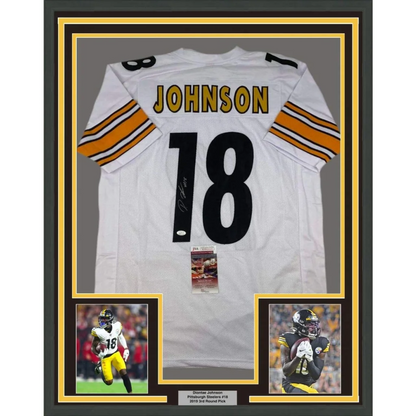 Front view of a framed autographed Diontae Johnson white Pittsburgh Steelers football jersey with black number 18 and striped sleeves