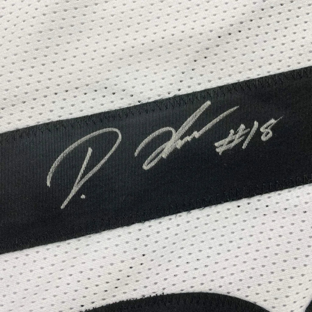 Framed autographed white mesh pittsburgh football jersey with black signature stripe and white autograph #18