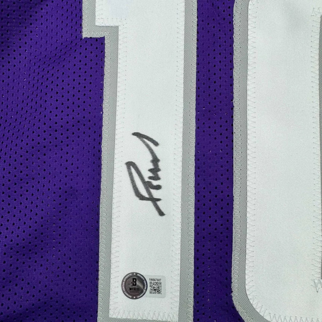 Purple Domantas Sabonis jersey with black autograph, perfect for your man cave setup