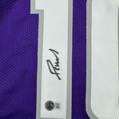 Purple Domantas Sabonis jersey with black autograph, perfect for your man cave setup