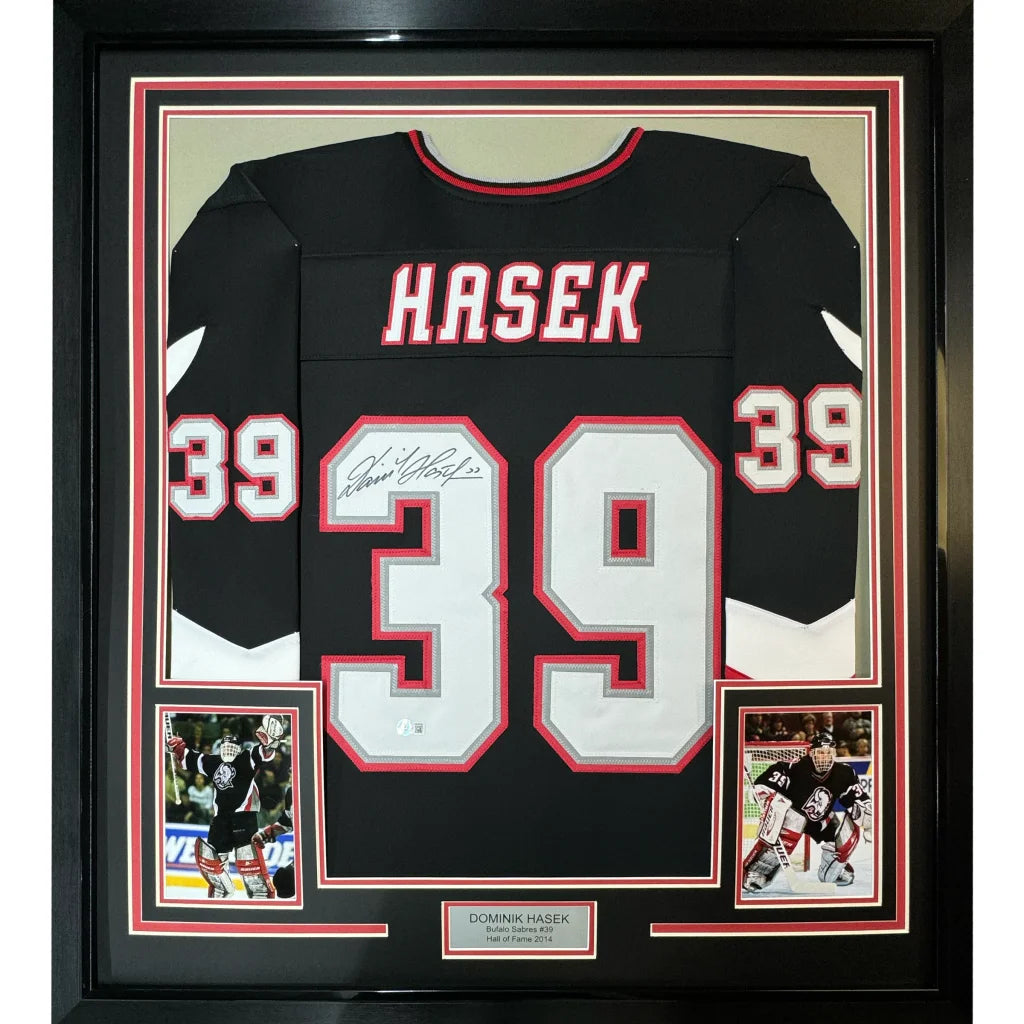 Framed autographed Dominik Hasek black Buffalo Sabres jersey with Hasek 39, Beckett BAS COA