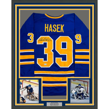 Framed blue and gold Autographed Dominik Hasek Buffalo Sabres Jersey with player photos