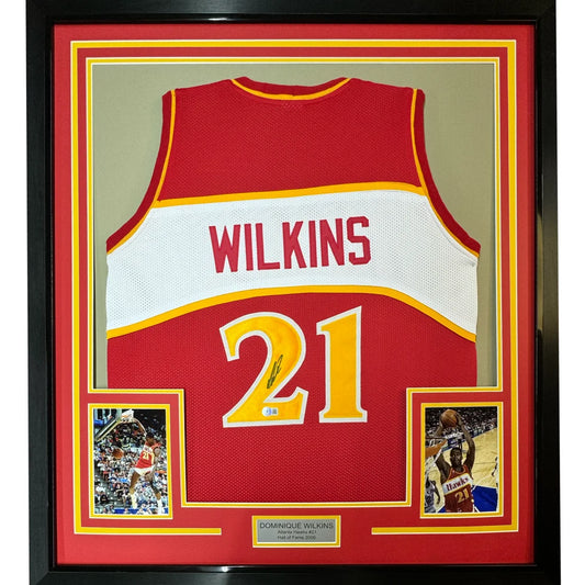 Framed Autographed Dominique Wilkins 35x39 Atlanta Red Basketball Jersey PSA/DNA COA | Hall of Fame Sports Memorabilia | vintageantiquesgifts.com