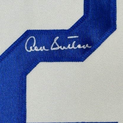 White sports jersey with blue number 2 and signature, perfect for your man cave