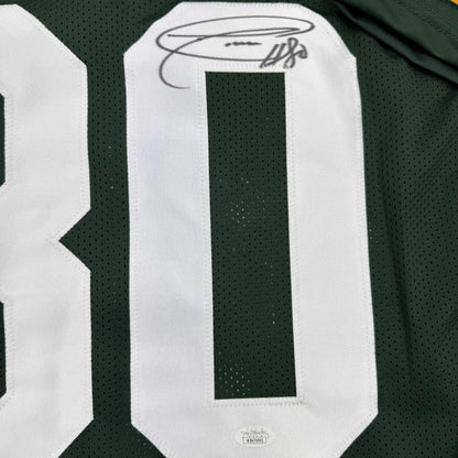 Green sports jersey with white numbers and signature from custom professional sports league jersey