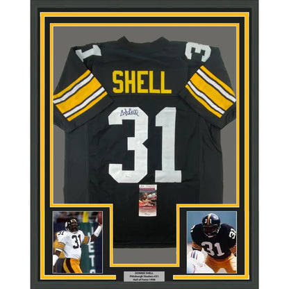Back of framed autographed Donnie Shell Pittsburgh Steelers black jersey number 31 Shell JSA COA