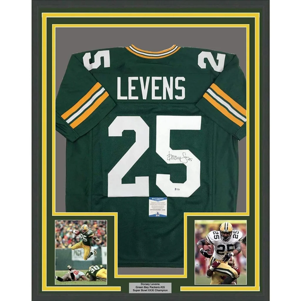 Back side of a framed green and gold green bay packers jersey with white number 25 and name Levens signed by Dorsey