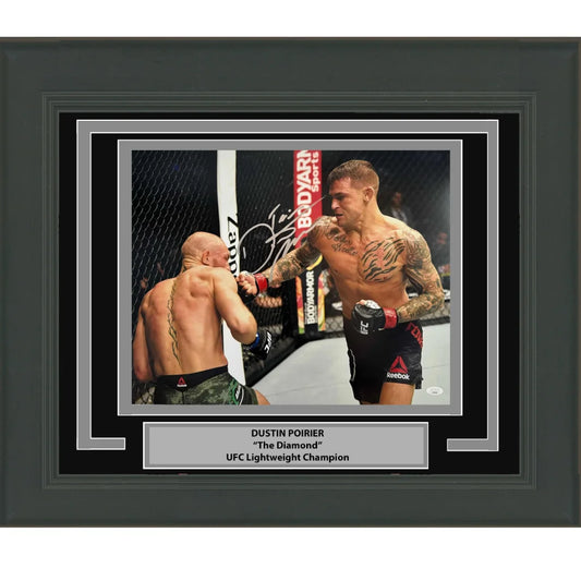 Signed black-framed photo of UFC champion Dustin Poirier in octagon action