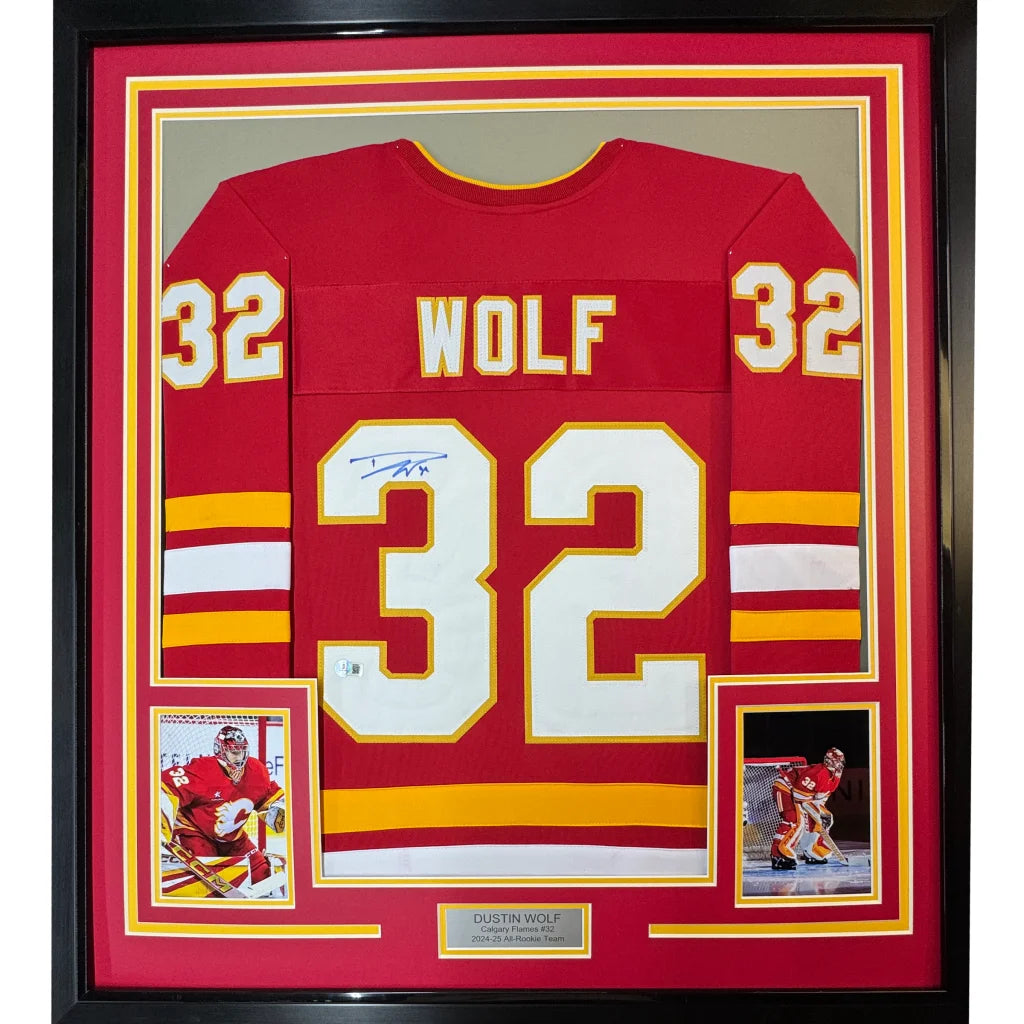 Framed autographed red Calgary Flames Dustin Wolf jersey with number 32