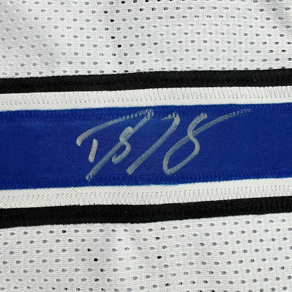 Professionally framed Dwight Howard Magic jersey with blue stripe and signature