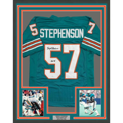 Back of framed autographed Dwight Stephenson Miami Dolphins teal jersey #57 JSA COA