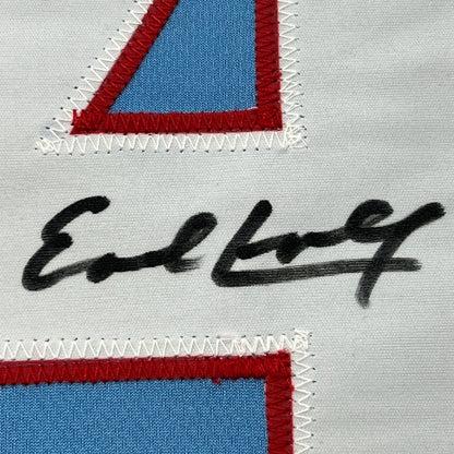 Autographed light blue and red fabric patch on white jersey from Campbell Collection