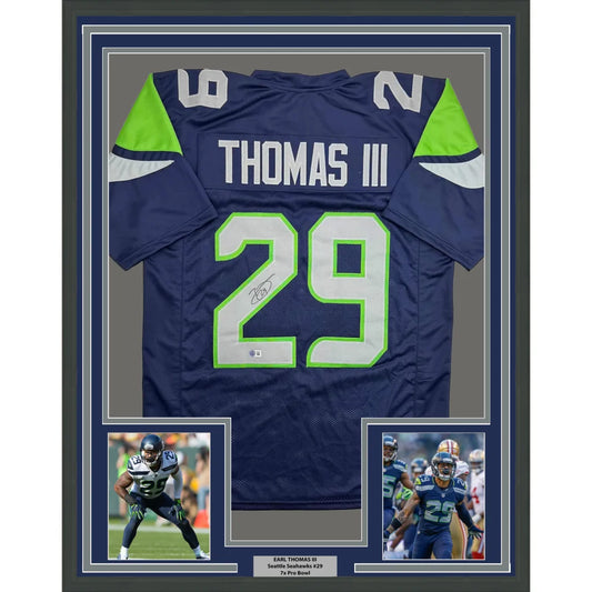 Framed Autographed Earl Thomas III 35x39 Seattle Blue Football Jersey Beckett BAS COA | Hall of Fame Sports Memorabilia | vintageantiquesgifts.com