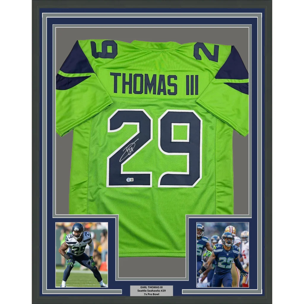 Framed back of autographed Earl Thomas III Seattle Seahawks lime green jersey, #29