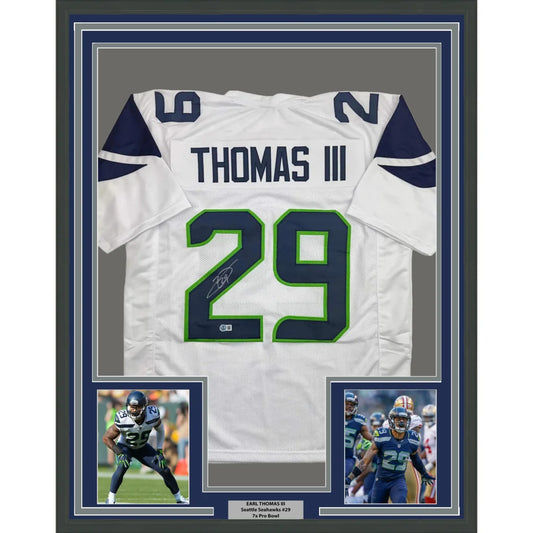 Framed Autographed Earl Thomas III 35x39 Seattle White Football Jersey Beckett BAS COA | Hall of Fame Sports Memorabilia | vintageantiquesgifts.com