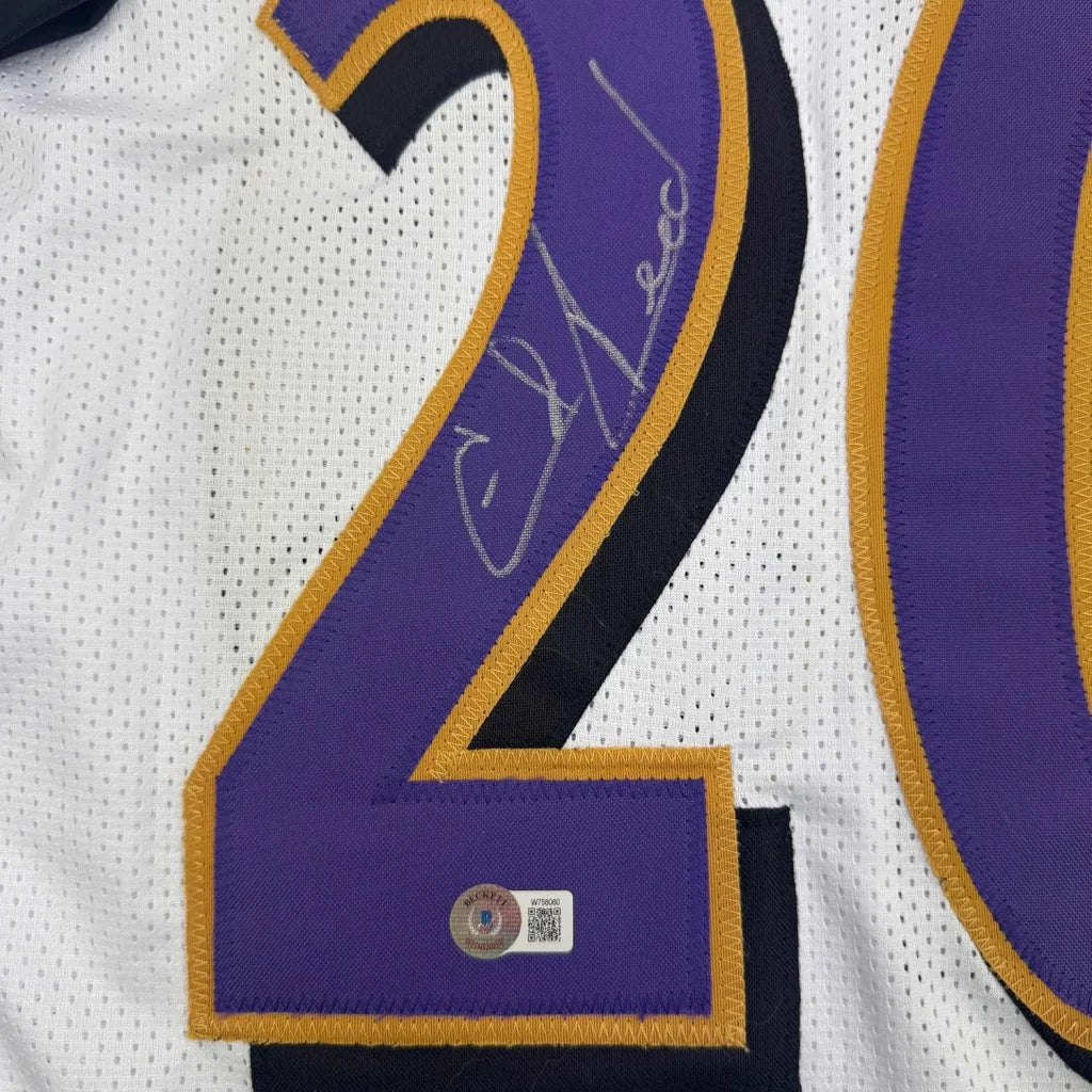Framed Autographed Ed Reed 35x39 Baltimore White Football Jersey Beckett BAS COA | Certified Authentic Signed Memorabilia | vintageantiquesgifts.com