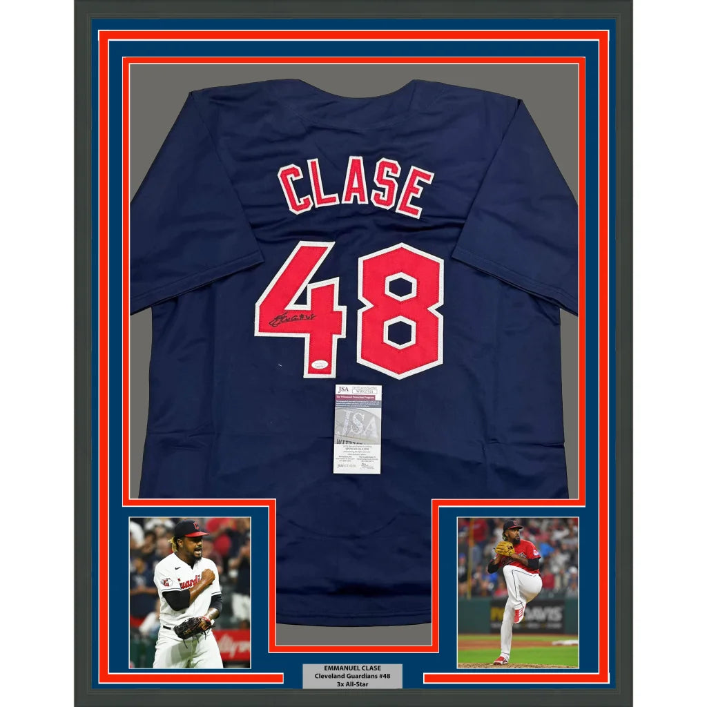 Framed autographed Emmanuel Clase navy blue Cleveland Guardians jersey back with red Clase 48 signature JSA COA