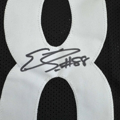 Black Emmanuel Sanders Steelers jersey with white 8 and autograph in a museum frame
