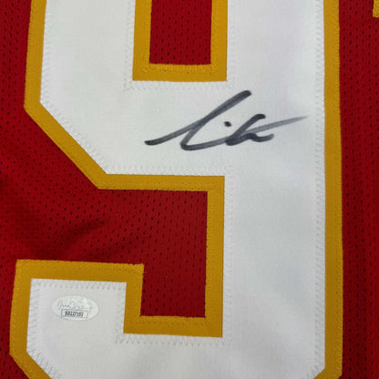 Red Chiefs jersey with white number 9, gold outline, black autograph, authentication sticker