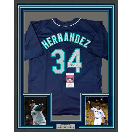 Professionally framed Seattle blue baseball jersey with Felix Hernandez autographs and photos