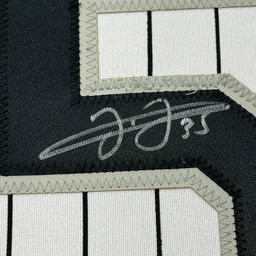 Autographed Frank Thomas jersey with pinstripes for a man cave display JSA COA