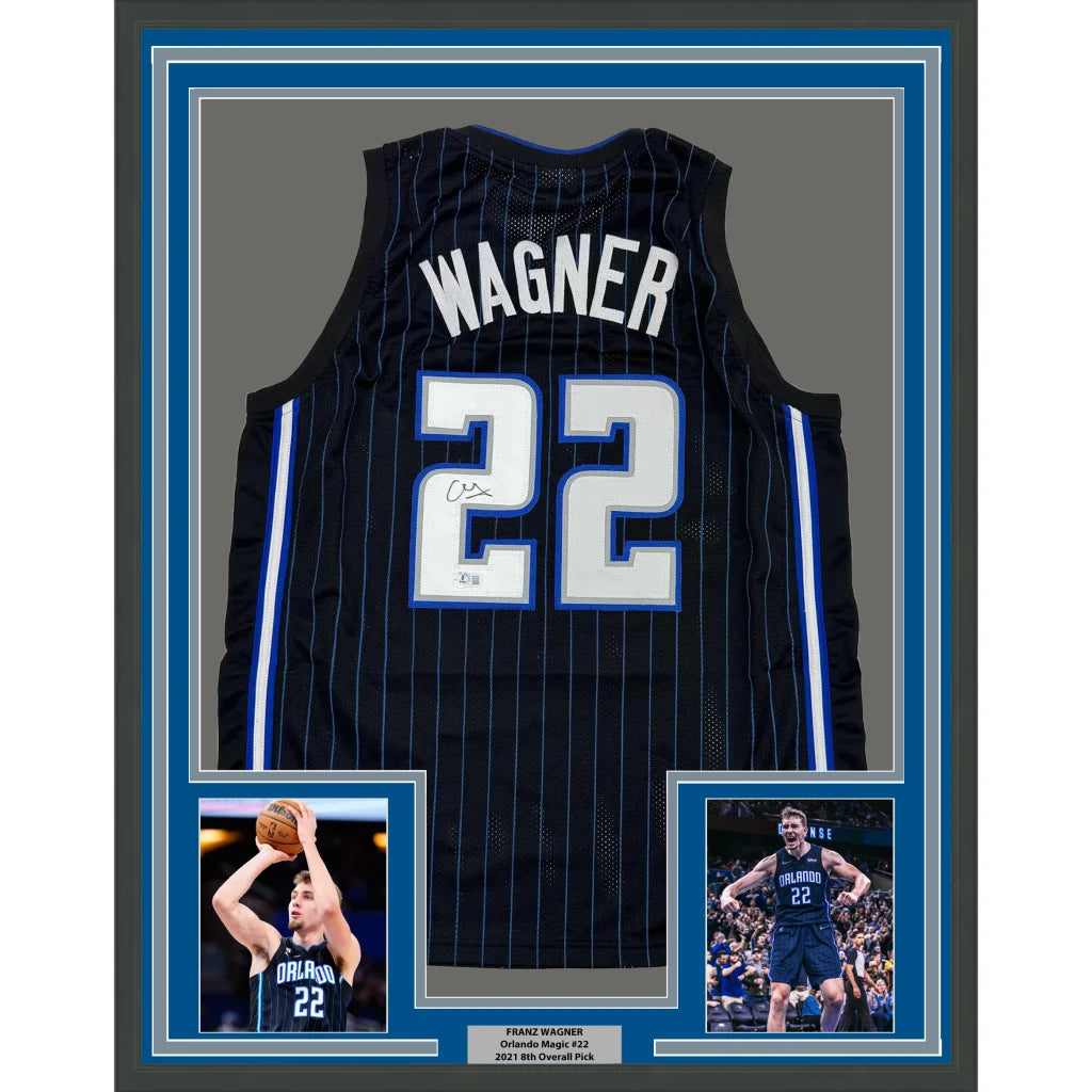 Framed Franz Wagner autographed Orlando Magic Jersey with player photos and plaque
