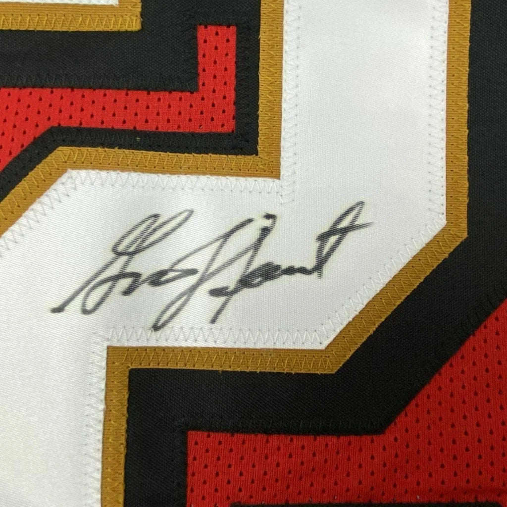 Autographed Garrison Hearst 49ers jersey with red black white gold accents in professional framing for your man cave