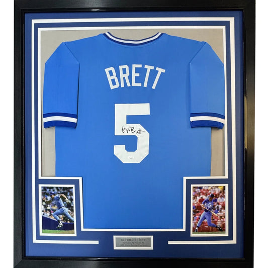 Framed George Brett Kansas City Blue jersey with autographs and player photos for your man cave