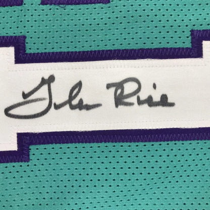 Autographed teal and purple Glen Rice framed jersey with photos for fans