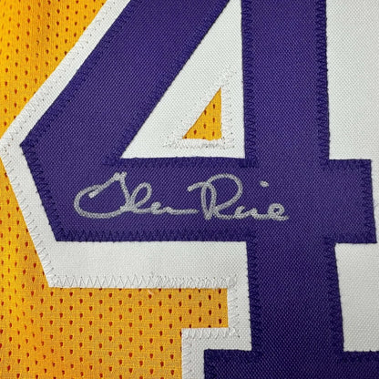 Signed yellow and purple Lakers jersey from Glen Rice ready for display