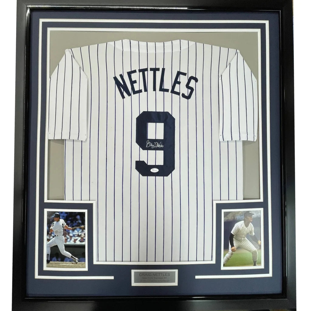 Framed signed New York Yankees pinstripe jersey with autograph and photos for fans