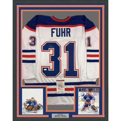 Framed Autographed Grant Fuhr 35x39 Edmonton White Hockey Jersey JSA COA | Hall of Fame Sports Memorabilia | vintageantiquesgifts.com