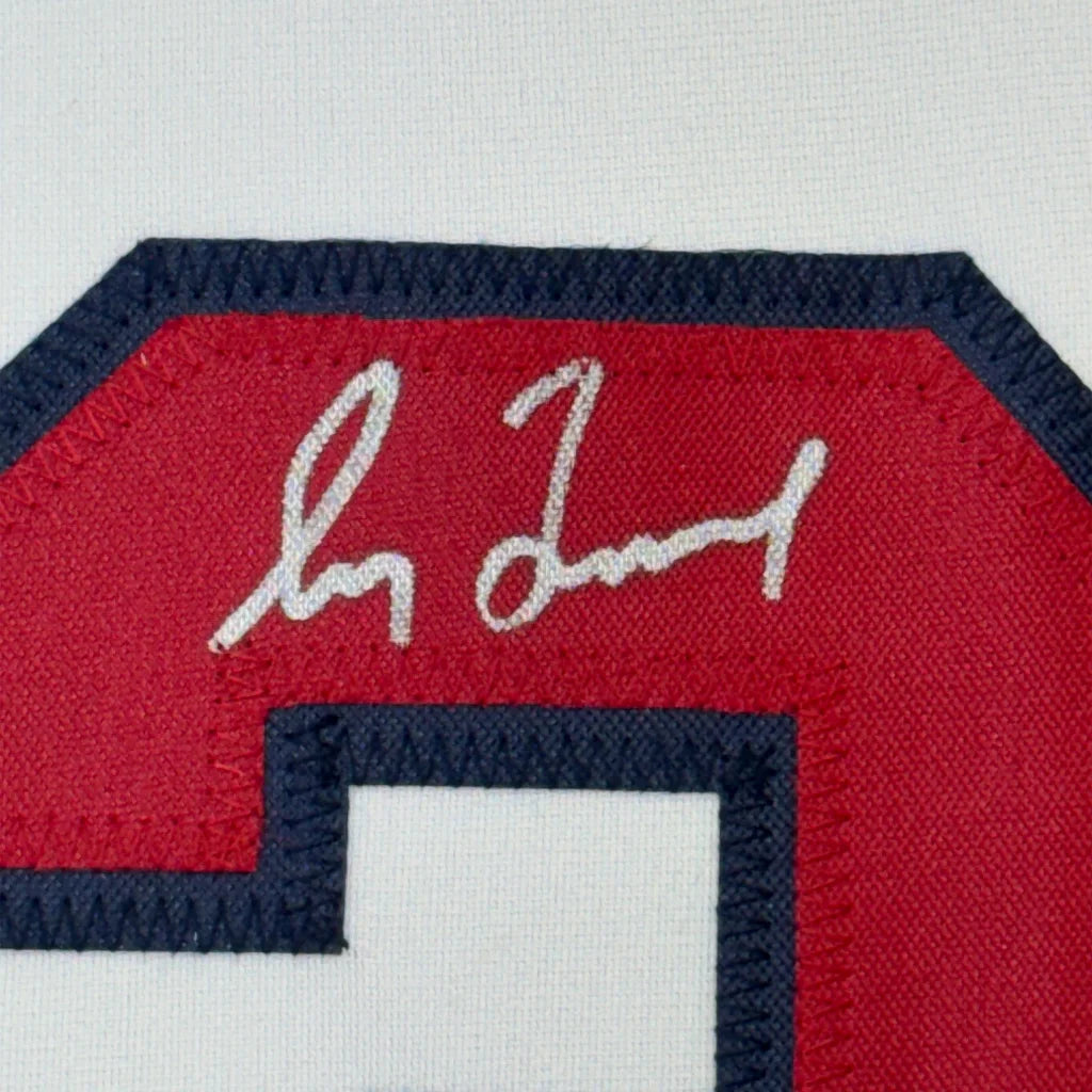 Autographed red and navy sports jersey patch on Game Changing Autographed Baseball Jersey Display