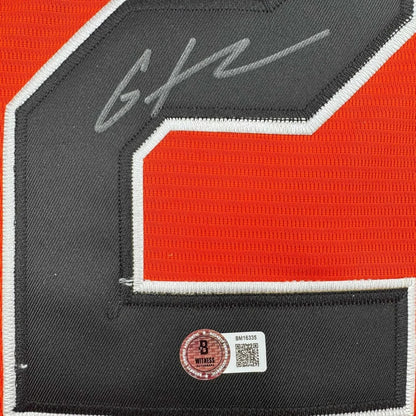 Framed autographed Gunnar Henderson orange Baltimore jersey number 2