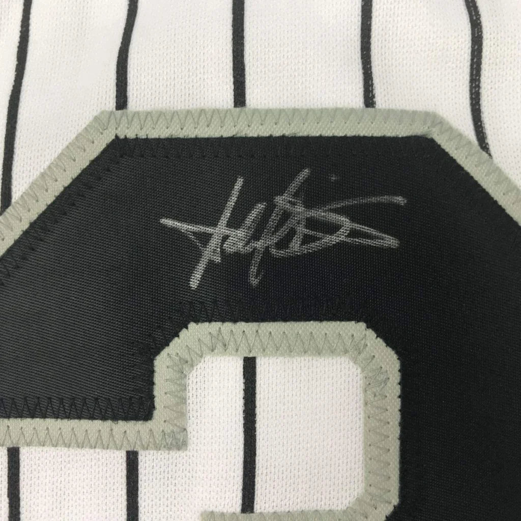 Framed autographed Harold Baines Chicago pinstripe jersey with Beckett COA
