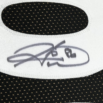 Black and white athletic wear with autograph from Jerome Bettis Steelers jersey display