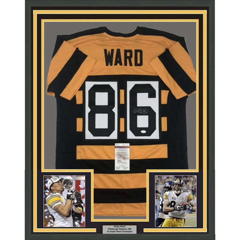 Back of framed autographed Hines Ward black gold Steelers jersey number 86