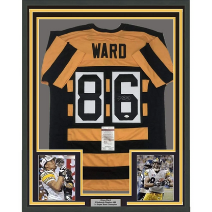 Back of framed autographed Hines Ward black gold Steelers jersey number 86