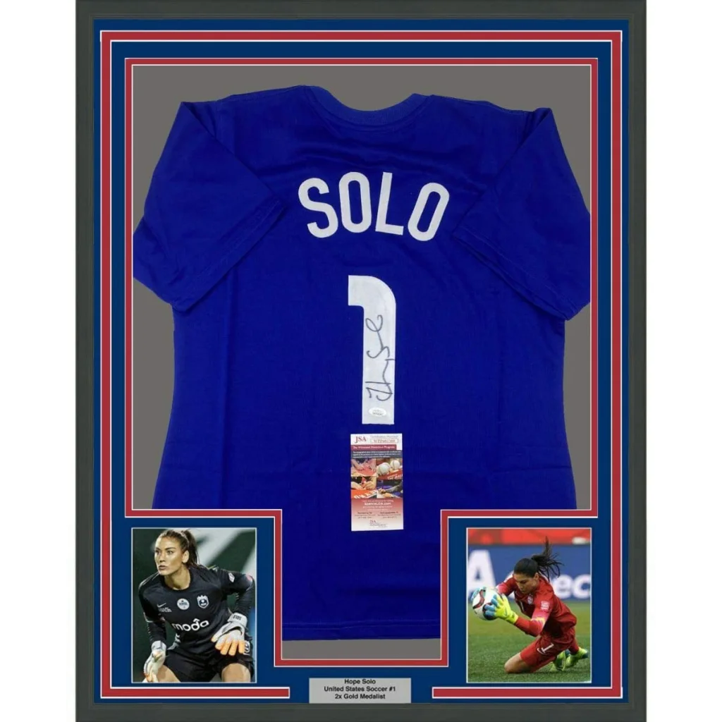 Framed autographed Hope Solo USA blue soccer jersey with number 1