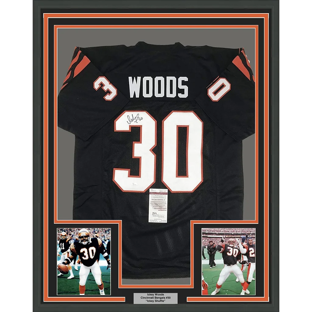 Framed signed Ickey Woods Bengals jersey with photos and descriptive plaque
