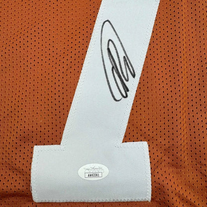 Autographed Orange Texas Longhorns BOND Jersey with white number one and authenticity sticker