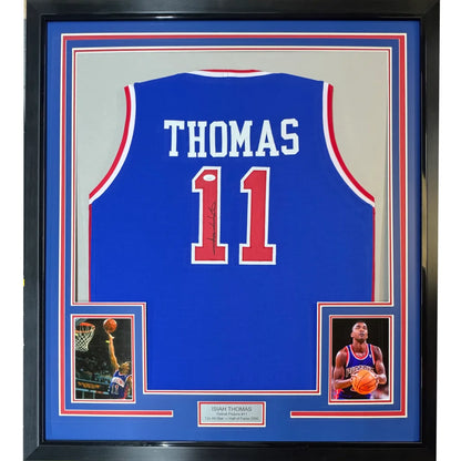 Framed autographed Isiah Thomas Detroit blue basketball jersey with number 11