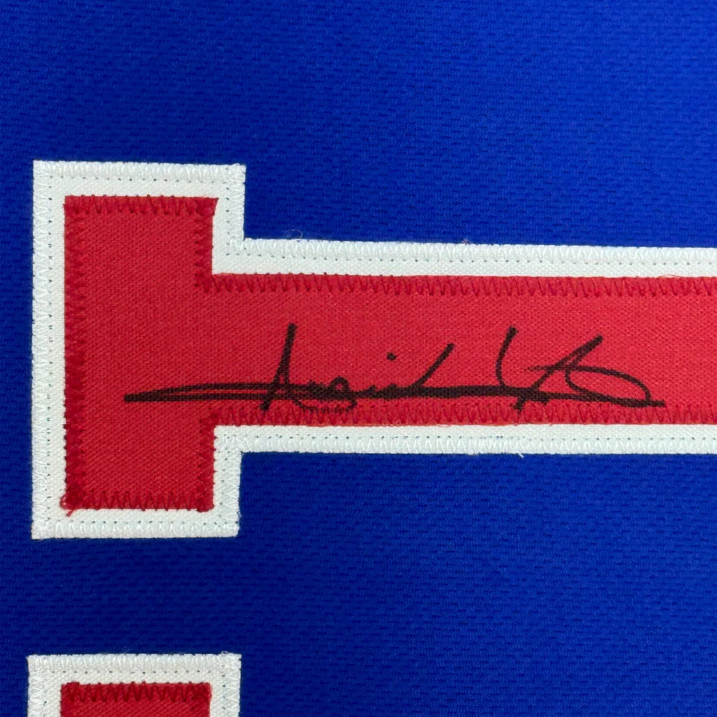 Framed autographed Isiah Thomas Detroit blue basketball jersey with embroidered red and blue T letter